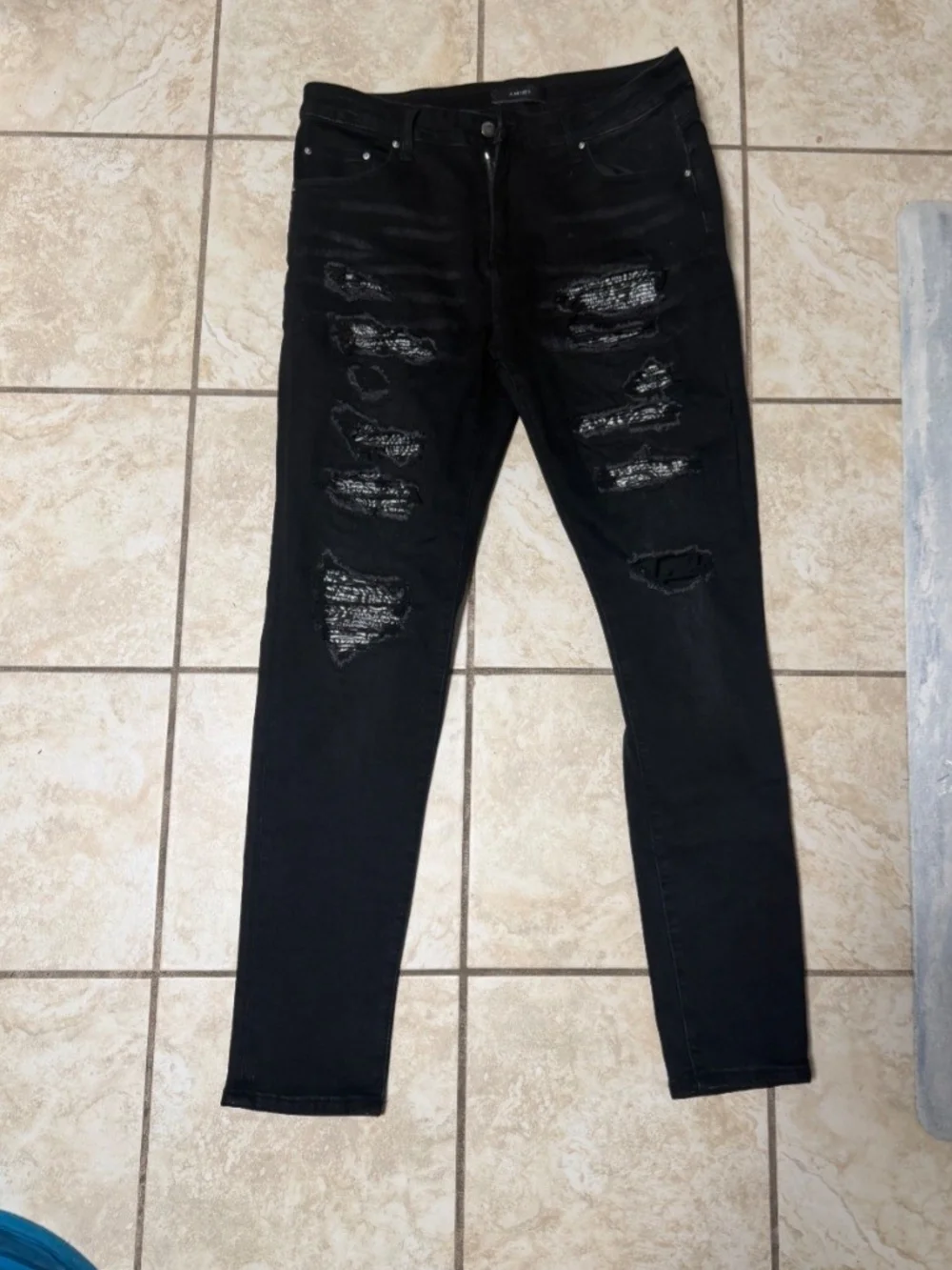 AMIRI Black Distressed Skinny Jeans